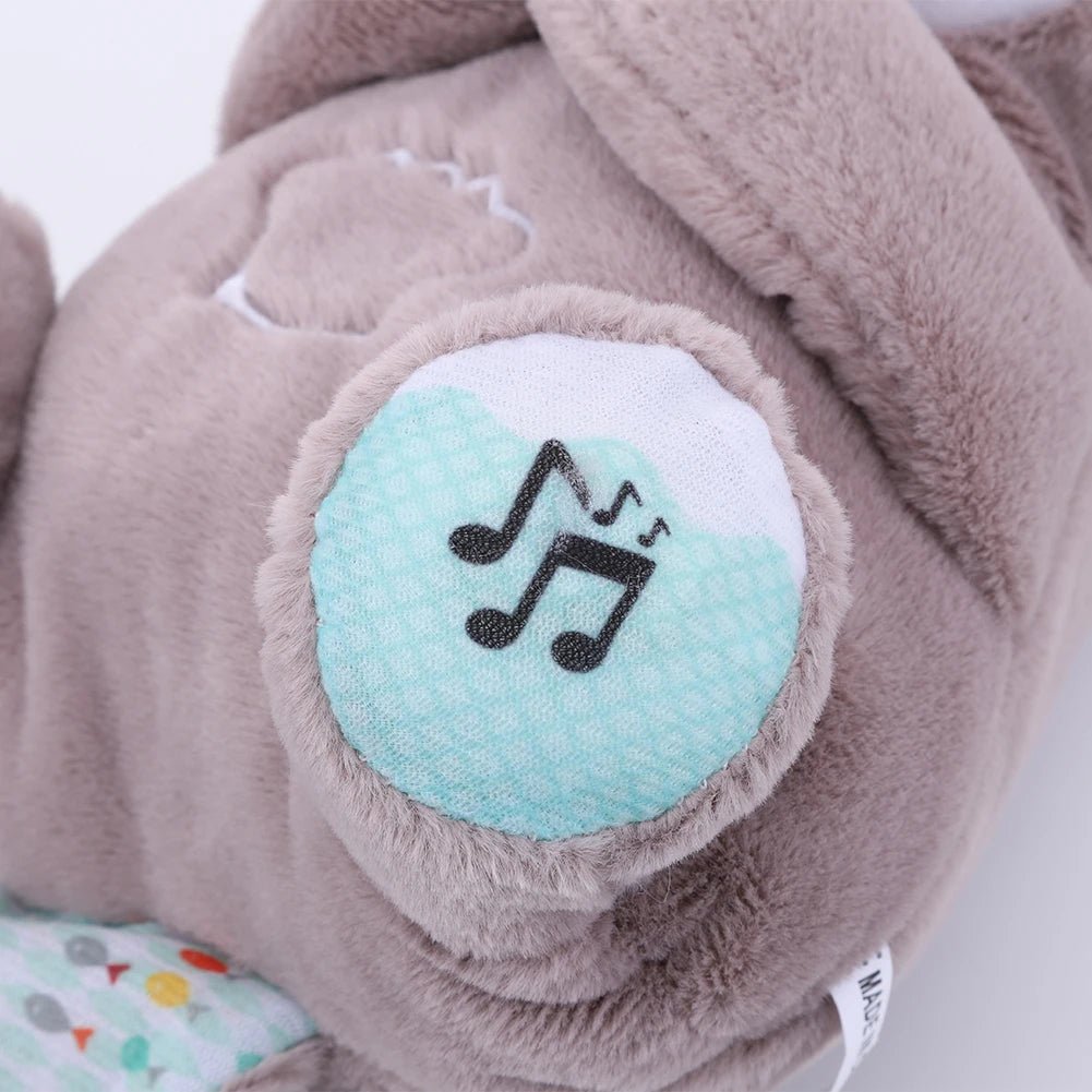 Peluche Apaisante musicale et lumineuse pour bebes l'univers des bebes
